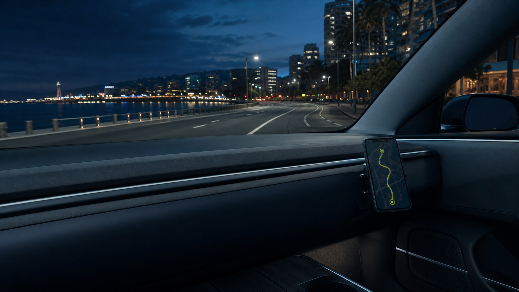 An electric-car cockpit at night with a phone displaying a route