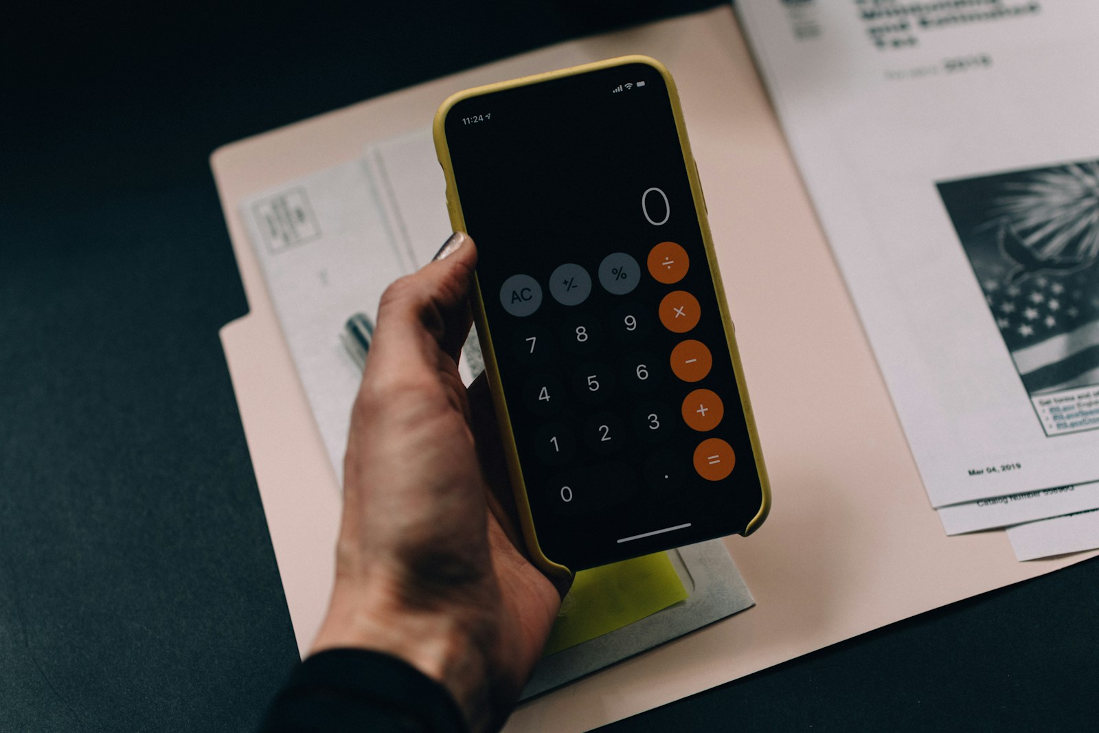 Calculator and financial documents used for treasury planning